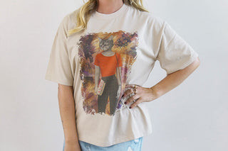 Unisex relaxed-fit T-shirt by Laura J Stratton featuring a velvet night-themed front design in soft, sand color.