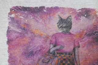 Close-up of Lavender Dream T-Shirt by Laura J Stratton, featuring lavender-colored fabric with artistic printed design.