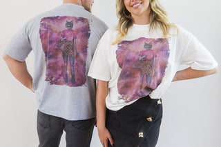 Lavender Dream T-Shirt by Laura J Stratton, front and back view in grey with lavender and white artistic design, relaxed fit.